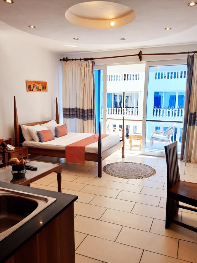 Cowrie Shell Beach Apartments Official Бамбури Екстериор снимка